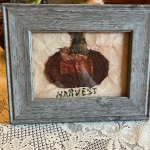 Craft made picture with pumpkin are out of cloth in frame 8 by 10